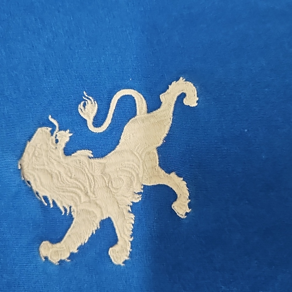 Blue V-Neck T-Shirt with White Lion Emblem - Picture 3 of 9